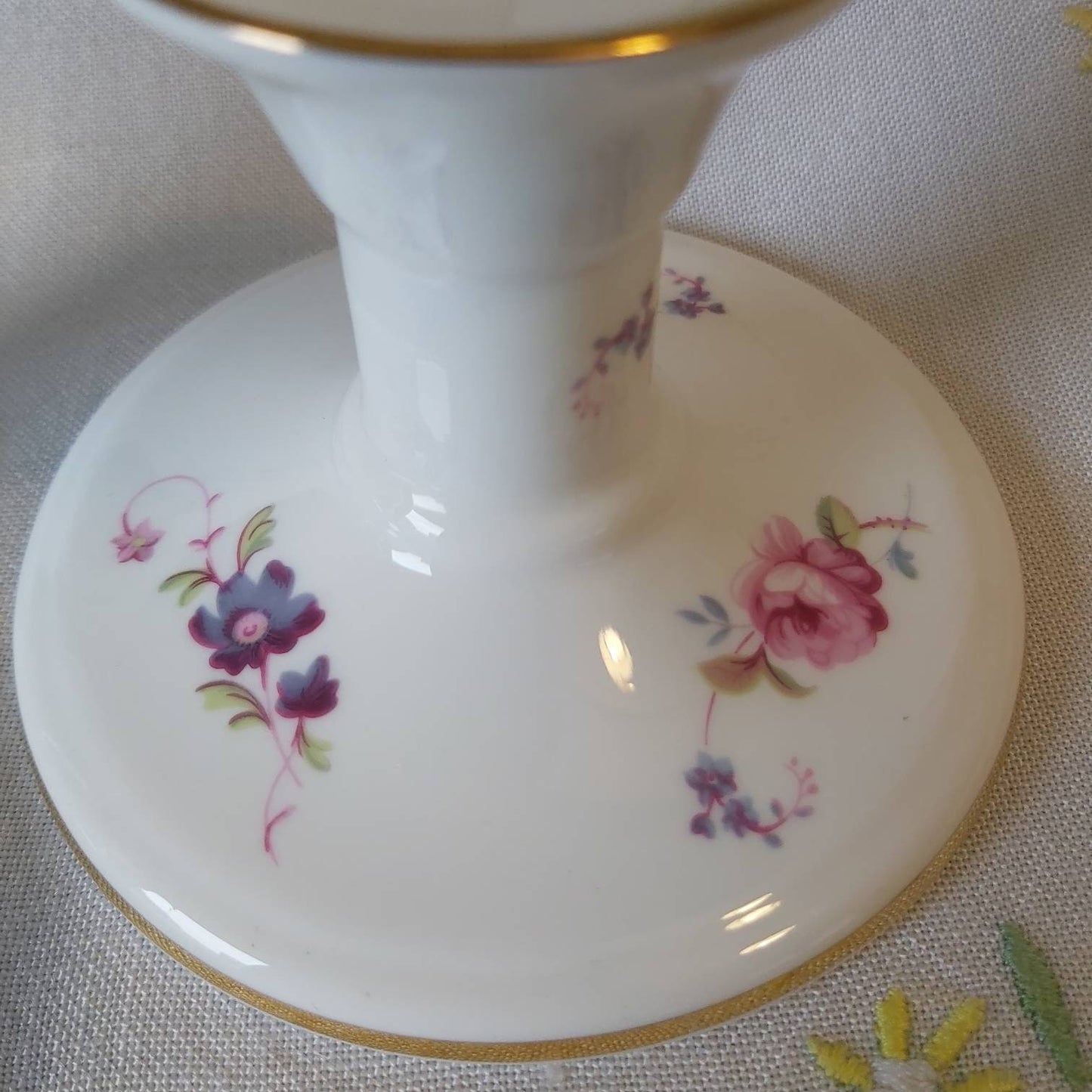 A Pair of Coalport Candlesticks Handpainted with Flowers