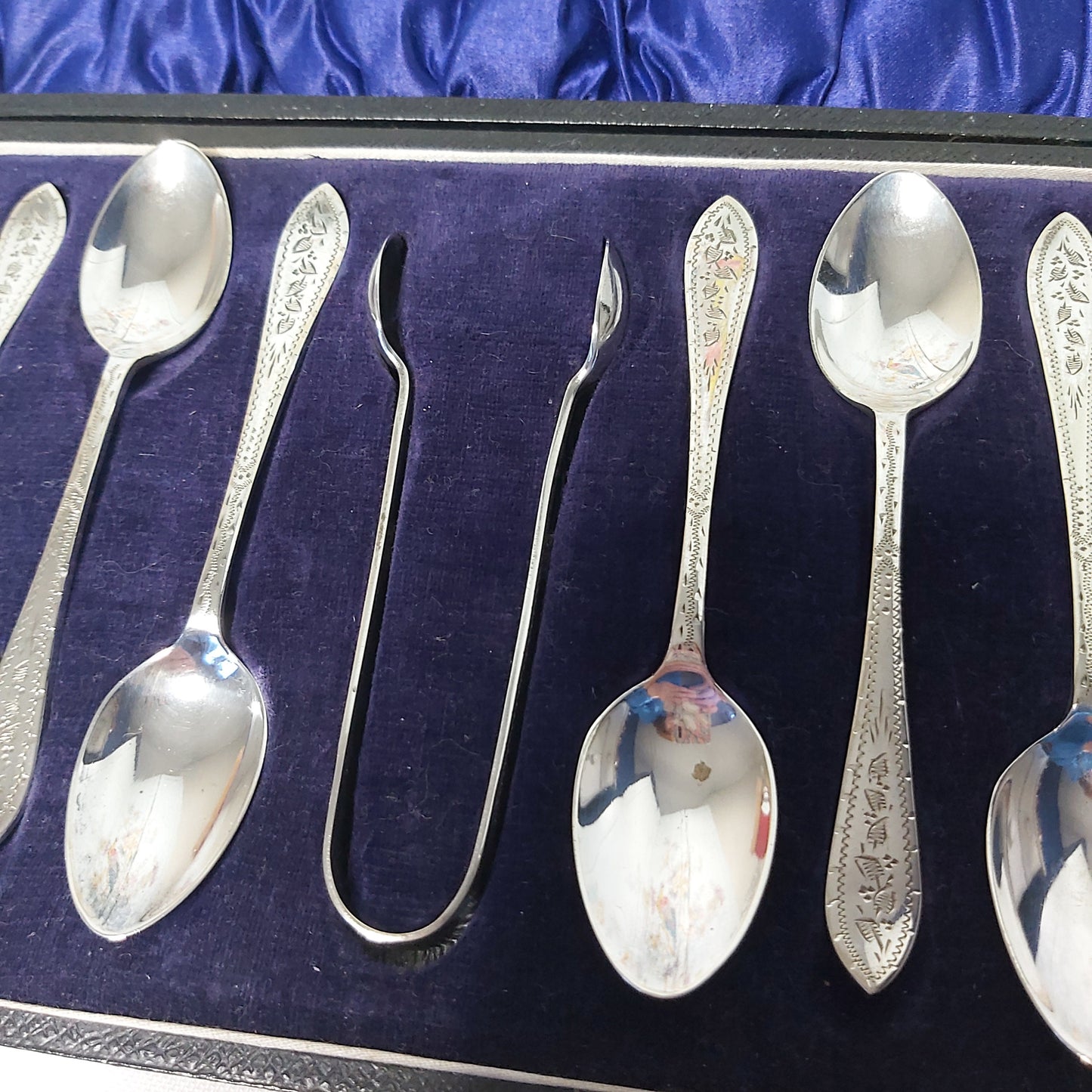 Boxed Set of Twelve Antique Silver Plated Teaspoons and Sugar Nips