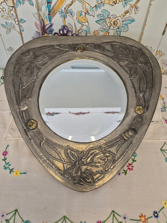 An Arts and Crafts Pewter Mirror