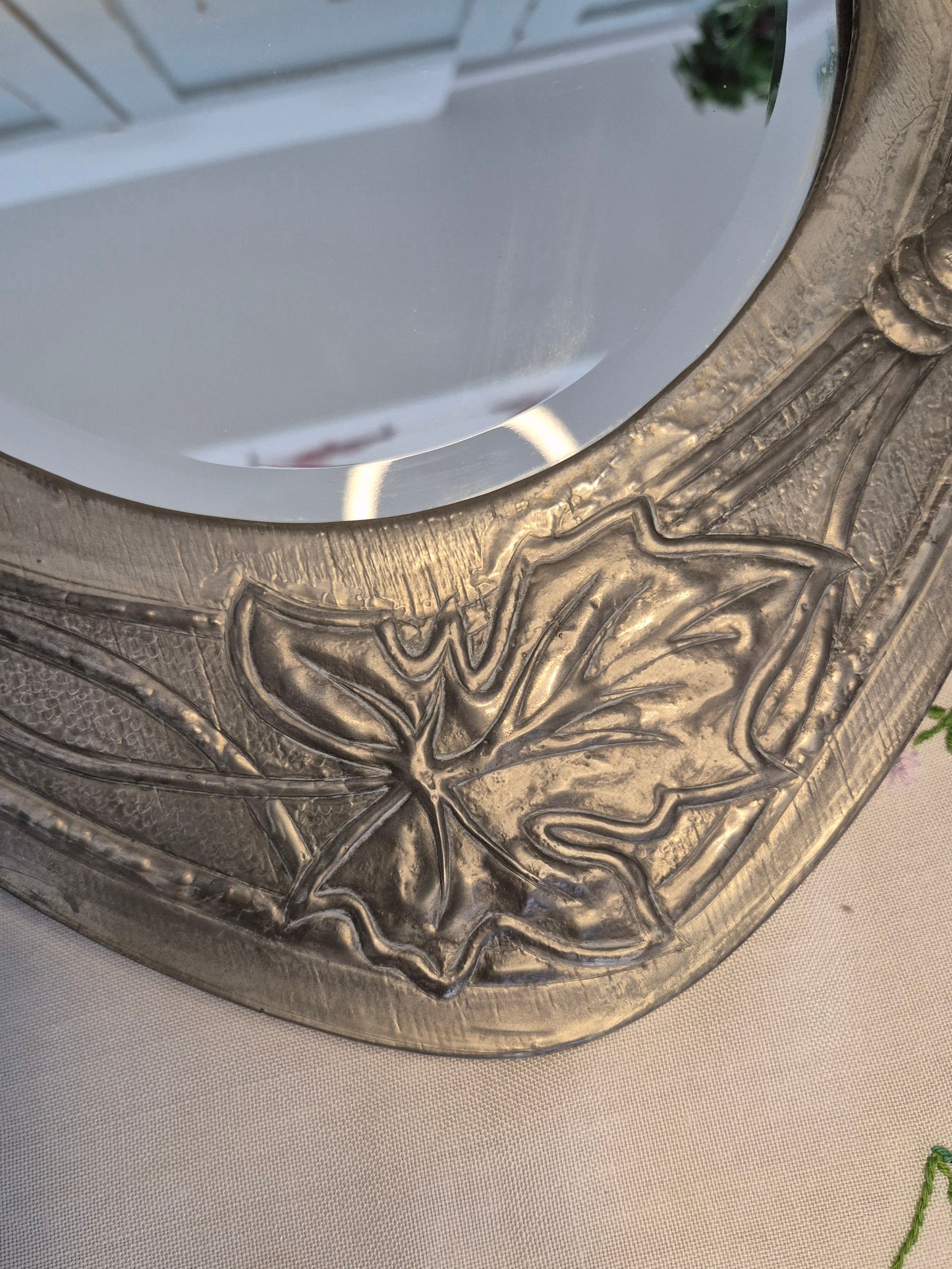 An Arts and Crafts Pewter Mirror