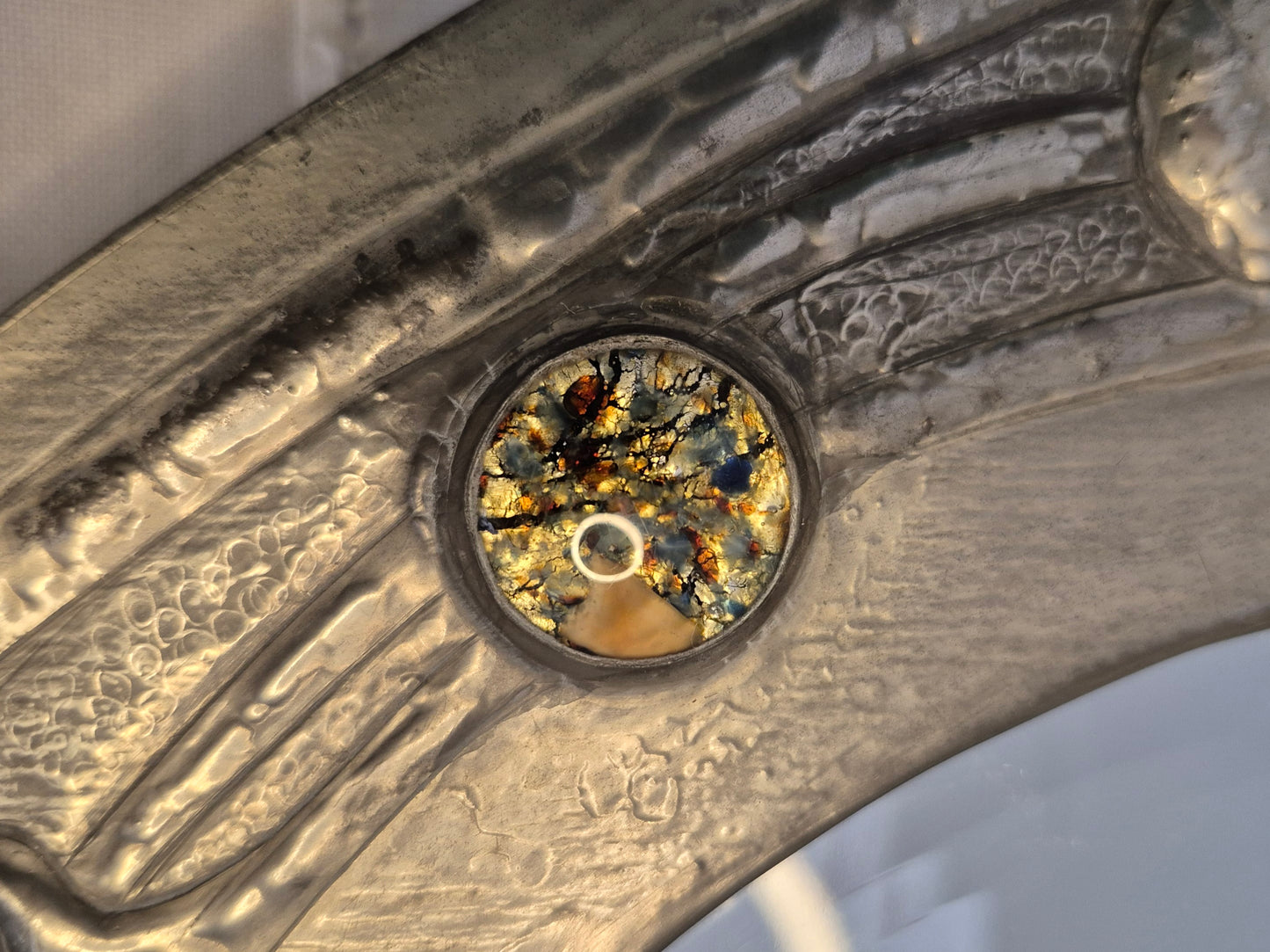 An Arts and Crafts Pewter Mirror