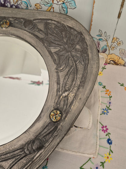An Arts and Crafts Pewter Mirror