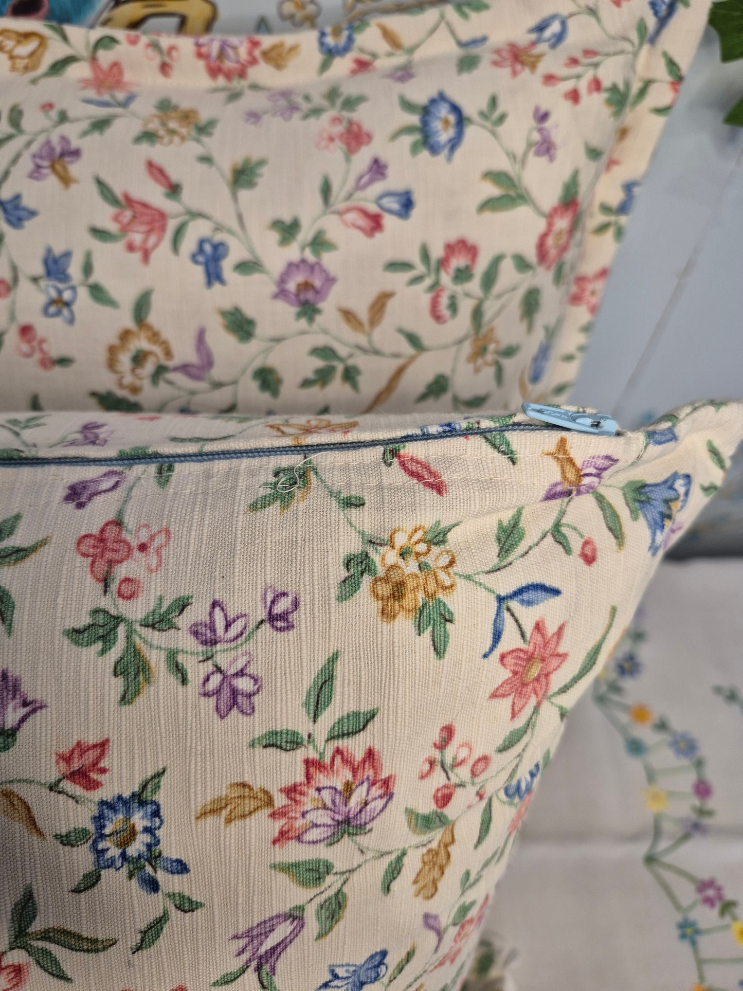 A Pair of Cushions Made From Reclaimed Floral Sanderson Fabric