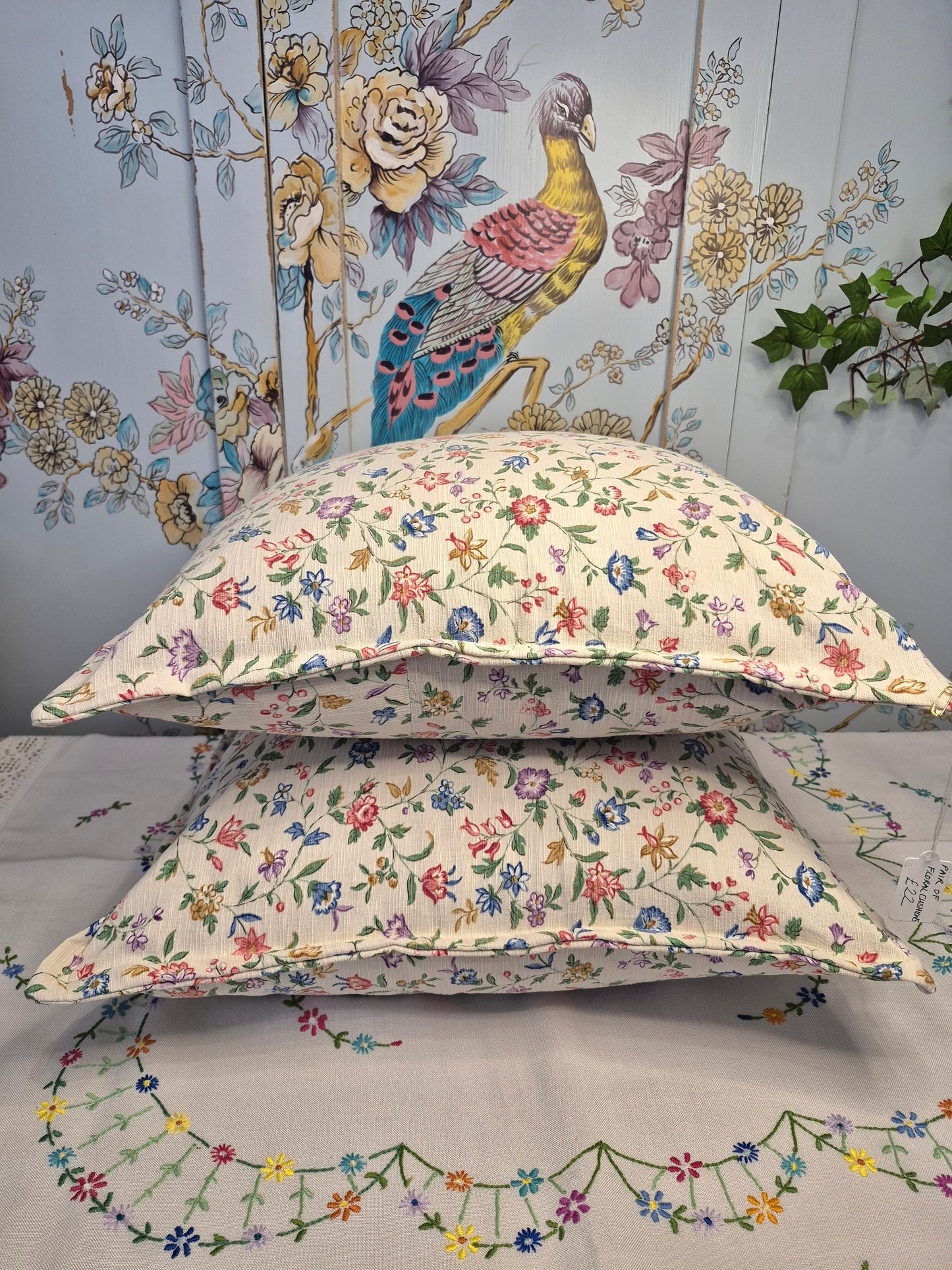 A Pair of Cushions Made From Reclaimed Floral Sanderson Fabric