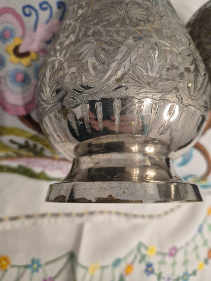 A Pair of Middle Eastern Silver Plated Vases