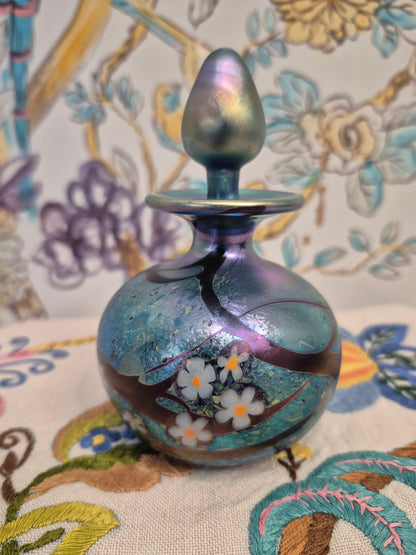 A 1984 Okra Glass Perfume Bottle in a Flower Design by Richard Golding