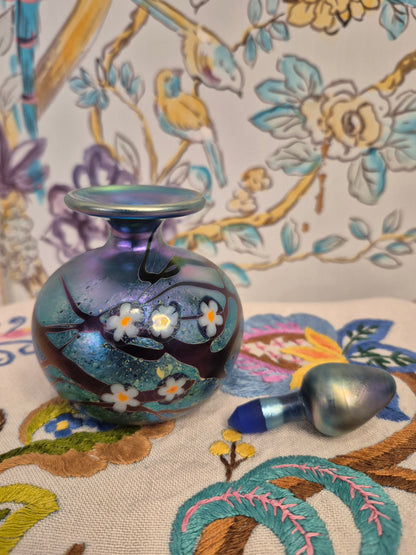 A 1984 Okra Glass Perfume Bottle in a Flower Design by Richard Golding