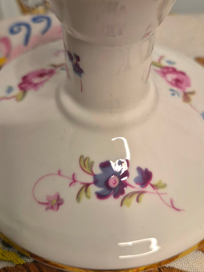 A Pair of Coalport Candlesticks Handpainted with Flowers