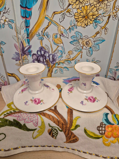 A Pair of Coalport Candlesticks Handpainted with Flowers