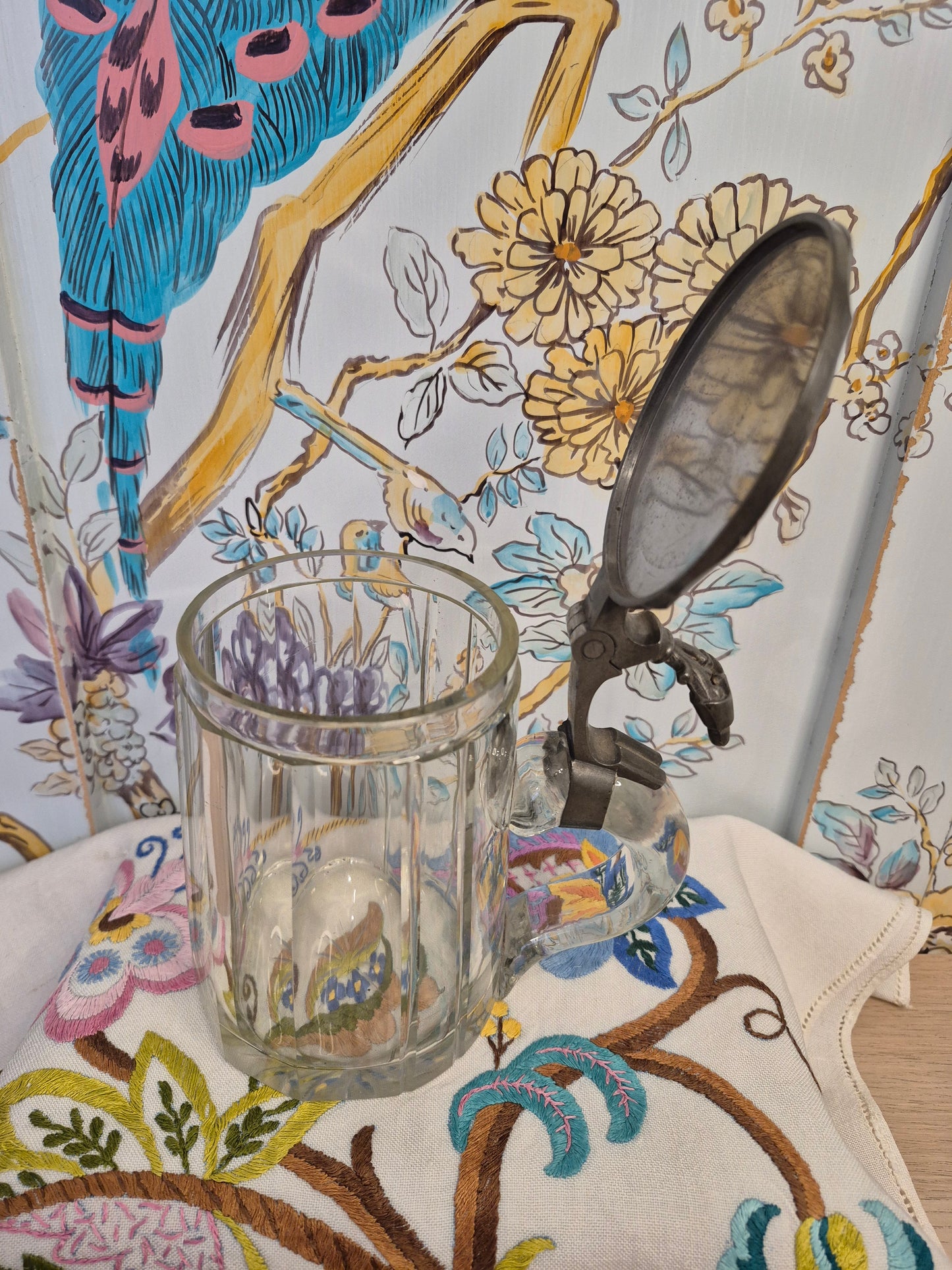 An Antique Glass Beer Stein with Handpainted Enamelled Lid