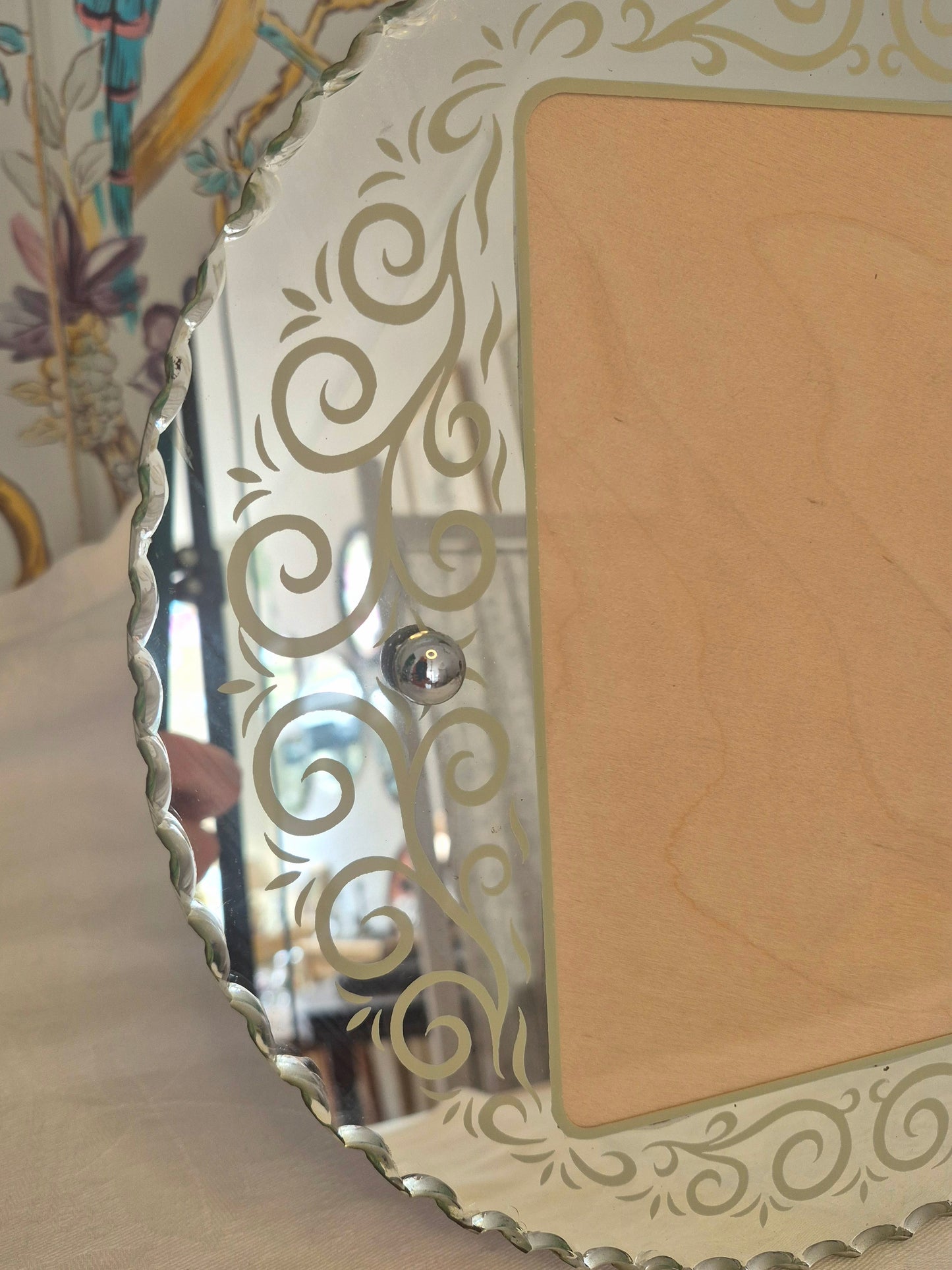 An Art Deco Mirrored Picture Frame
