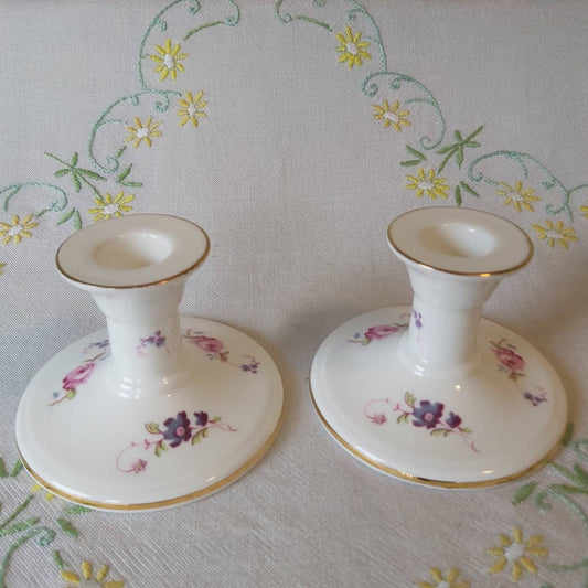 A Pair of Coalport Candlesticks Handpainted with Flowers