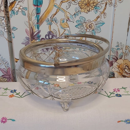 A Large Antique Cut Glass Bowl with Silver Plated Mounts and Swing Handle