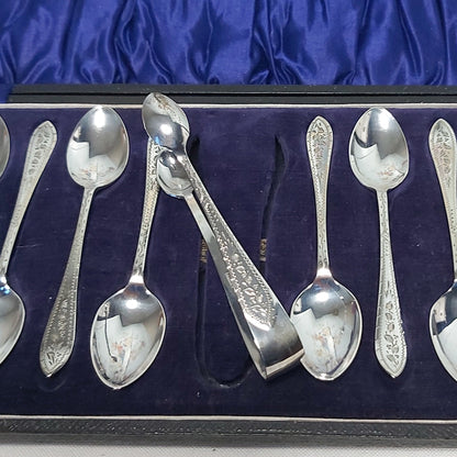 Boxed Set of Twelve Antique Silver Plated Teaspoons and Sugar Nips