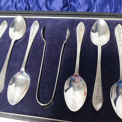 Boxed Set of Twelve Antique Silver Plated Teaspoons and Sugar Nips