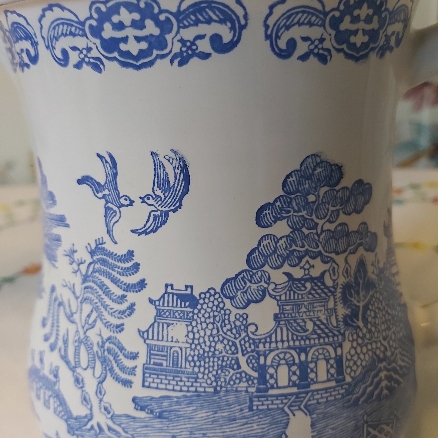 Vintage Willow Pattern Enamel Ware Jug in the Blue and White Willow Pattern