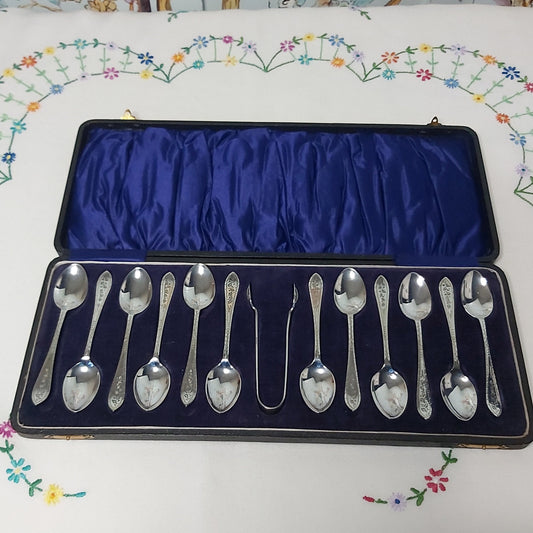 Boxed Set of Twelve Antique Silver Plated Teaspoons and Sugar Nips