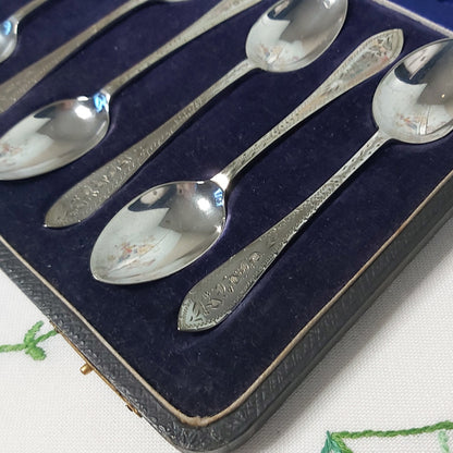 Boxed Set of Twelve Antique Silver Plated Teaspoons and Sugar Nips